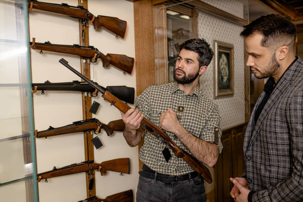Rightful Liberty Arms | How to Choose the Best Firearm Broker in Reno in 2026 Firearm broker in Reno showing guns to customer